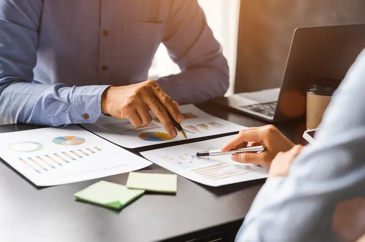 Reviewing business tax documents at a desk